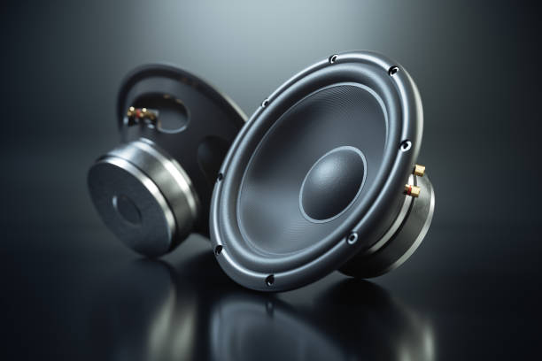 two sound speakers on black background - car stereo imagens e fotografias de stock