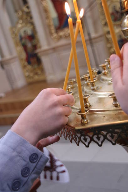 istock Burning candles in a church 694828276