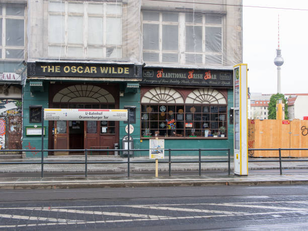 Berlin: The Oscar Wilde, Traditional Irish Bar With TV Tower in Background Berlin: The Oscar Wilde, Traditional Irish Bar With TV Tower in Background oscar wilde stock pictures, royalty-free photos & images