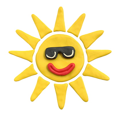 Yellow sun with smile in black sunglasses. Plasticine. Isolated on a white background. The concept of children's creativity or sunny weather