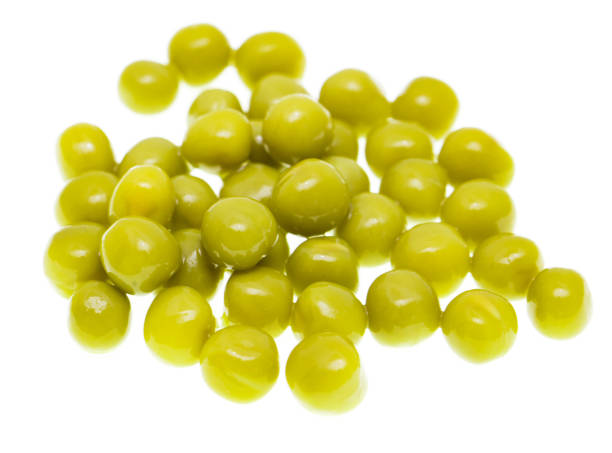 istock Pickled green peas isolated on white background 694845156