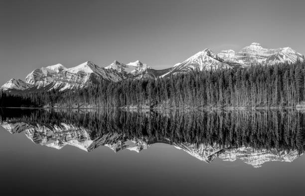 istock Mountains reflecting in Hebert Lake, Banff National Park 694849680
