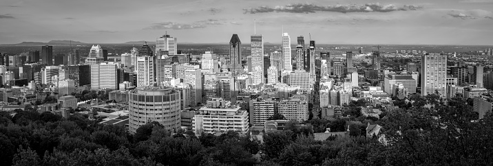 Panoramic view of the City of Montreal during the sunset with showdows casting on the downtown skyscrapers