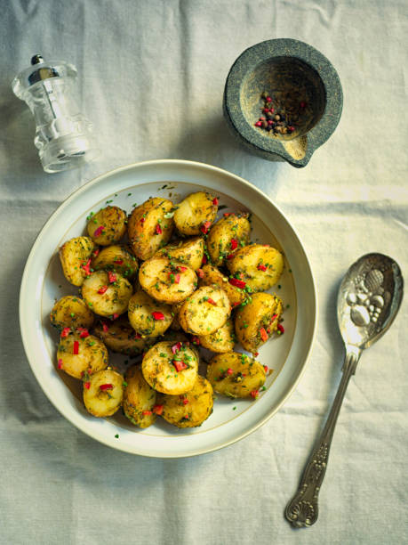 istock Spicy herbs potatoes salad 694852422