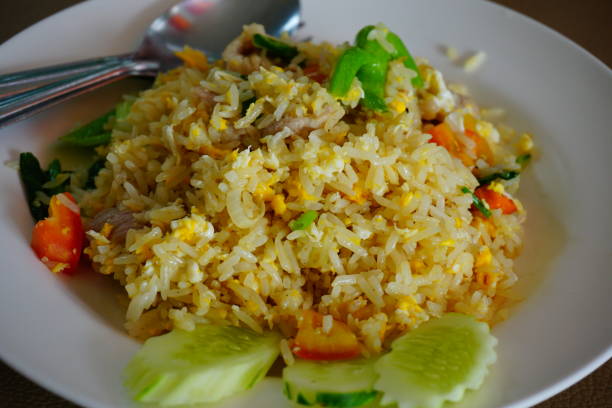 istock A close-up of crab fried rice for dinner 694865496