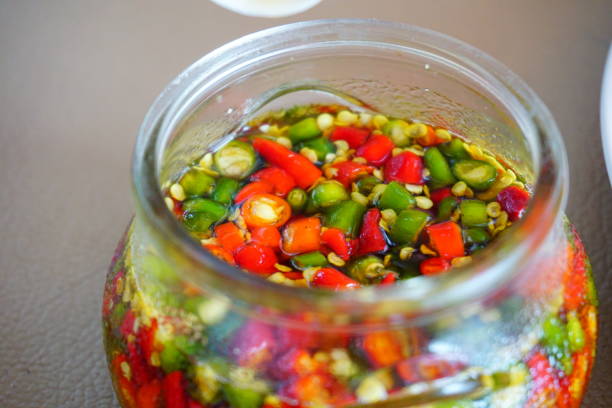 istock Vietnamese fish sauce with red hot chilli 694865576
