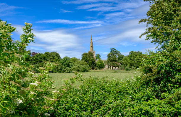 istock Tranquil english rural scene showing a well maintained paddock area. 694872016
