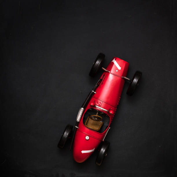 istock Vintage race car isolated on white background 694875248