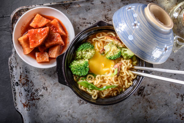 istock Ramen Noodle with Egg yolk and Broccoli 694875766