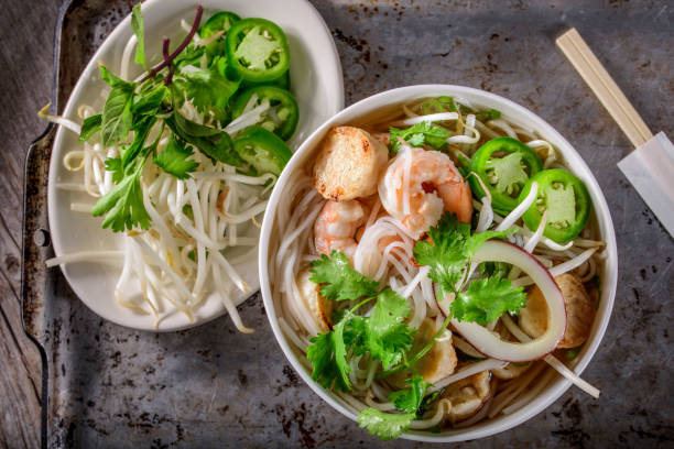 istock Pho, Vietnamese Soup Bowl, with seafood 694875980
