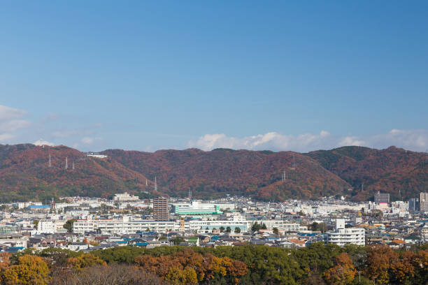 istock City residence area with mountain covered and clear blue sky background 694882584