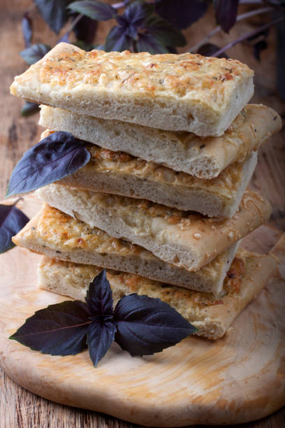 istock Cheese homemade bread on a wooden board 694882880