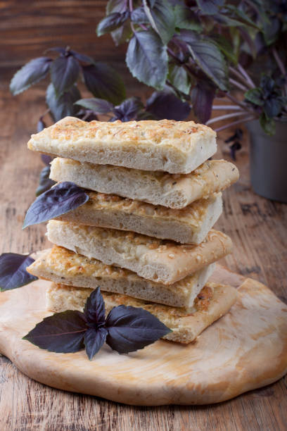 istock Cheese homemade bread on a wooden board 694882946
