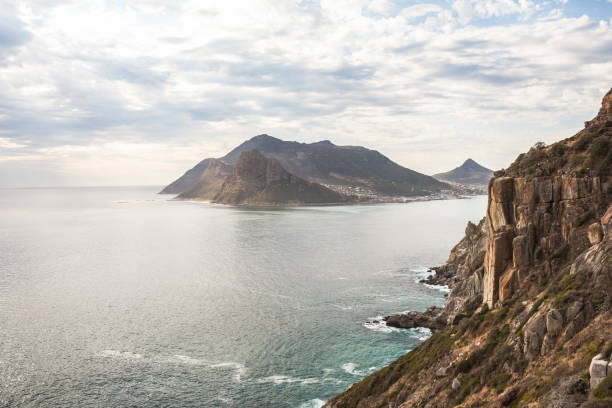 istock Wonderful panorama view on Hout Bay from Chapmans Peak Drive 694886756