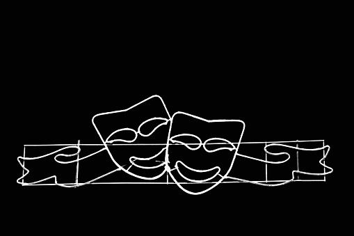 Two smiling masks (black and white)