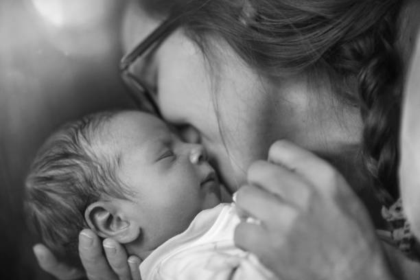 istock Mother with newborn baby 694898118