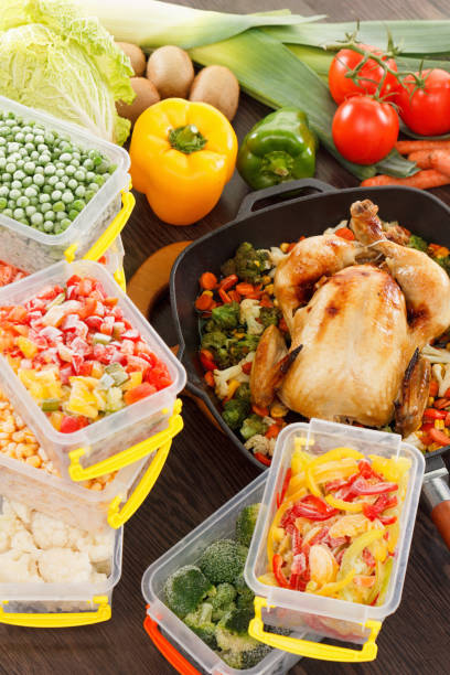 istock Roasting frozen vegetables and chicken food 694900558