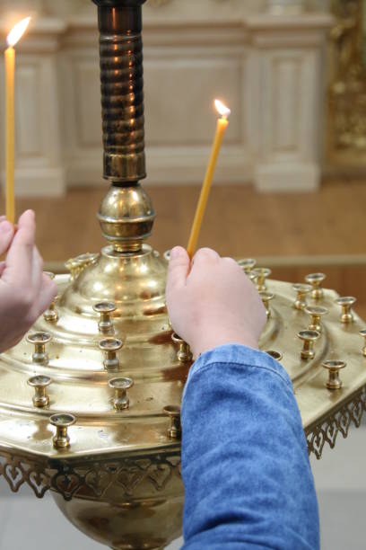 istock Burning candles in a church 694913102
