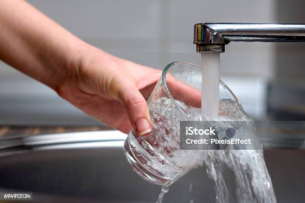 Drinking Water Stock Photo - Download Image Now - Faucet, Drinking Glass, Glass - Material