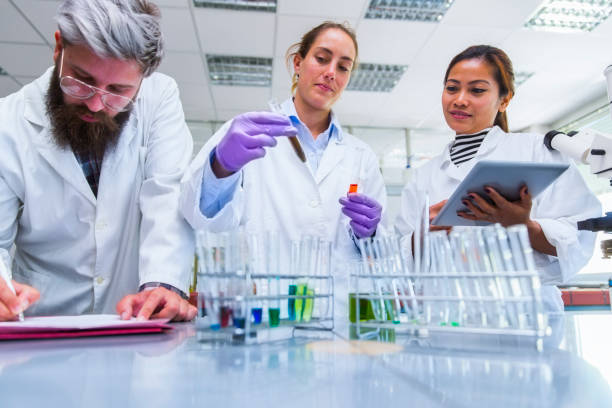 istock Youn scientists in a chemical laboratory 694918516
