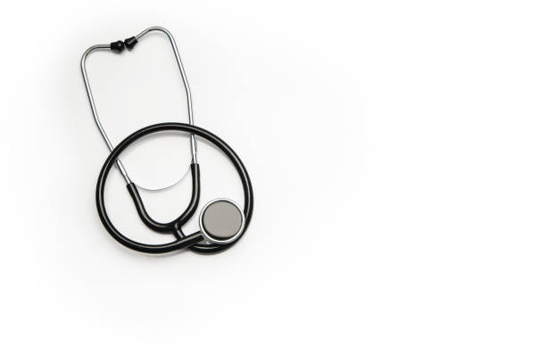 istock Stethoscope isolated on white background. Top view photograph 694933884