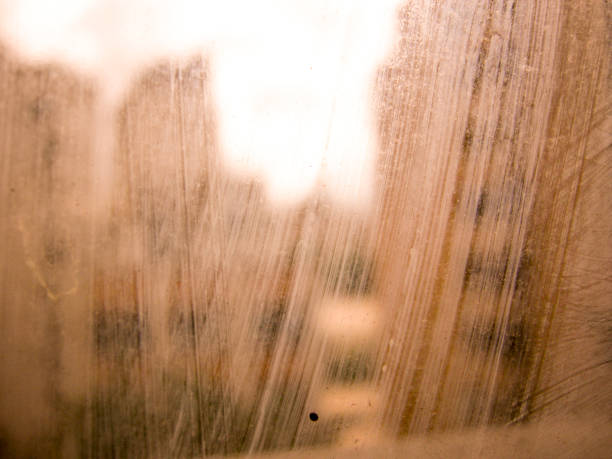 Ceramic cups seen through an apartment window in a towns on the island of Île de Ré, France