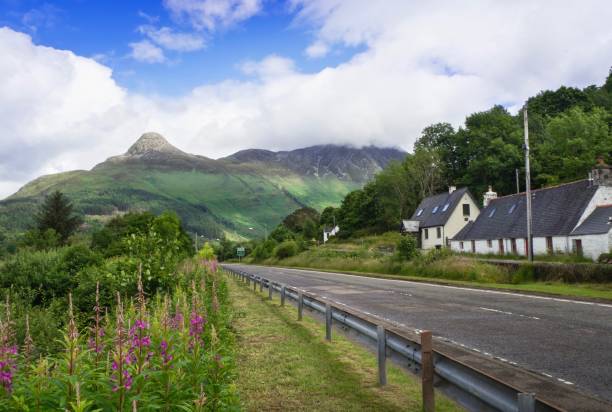 istock Beautiful Road In Scotland , UK 694959864