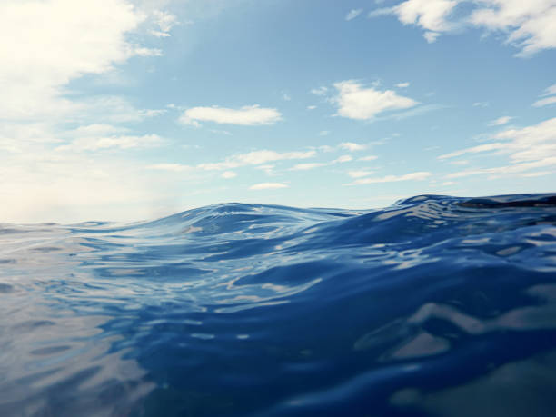 istock Blue sea and sun on sky 694976824