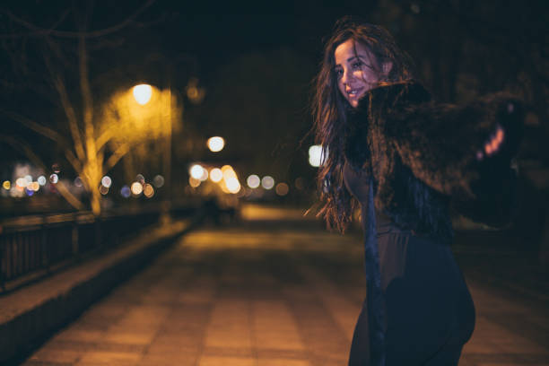 istock Beautiful woman having night out 694980468