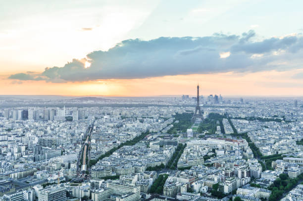 istock Aerial view of Eiffel Tower and Paris during sunset 694983326