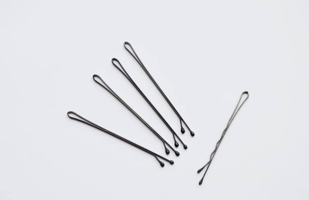 istock iron hairpin on white background 694989396