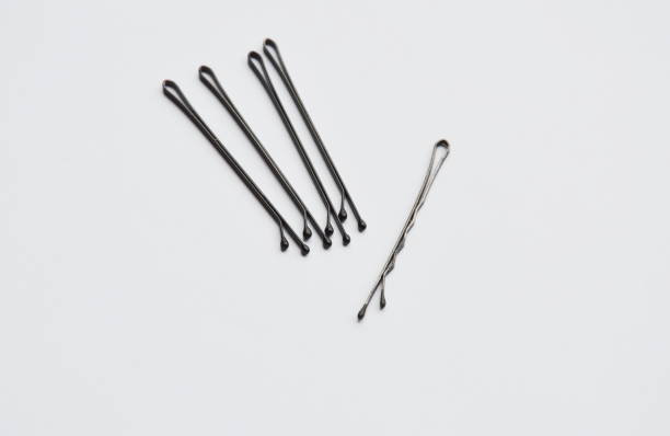 istock iron hairpin on white background 694991892