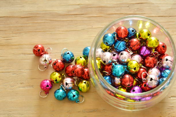 istock colorful bells in glass bottle 694994586