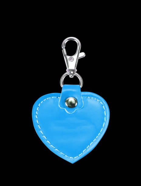 istock Leather Round Keychain with clip lock for Key Isolated on black background 694997466