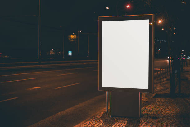 istock White information poster mock up in night urban settings 695004652