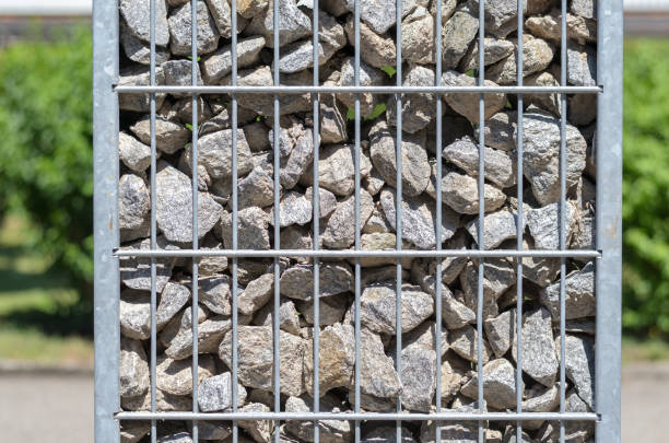 istock Steel container filled with stones and rocks 695015080