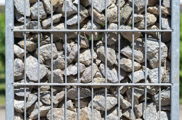 istock Steel container filled with stones and rocks 695015652