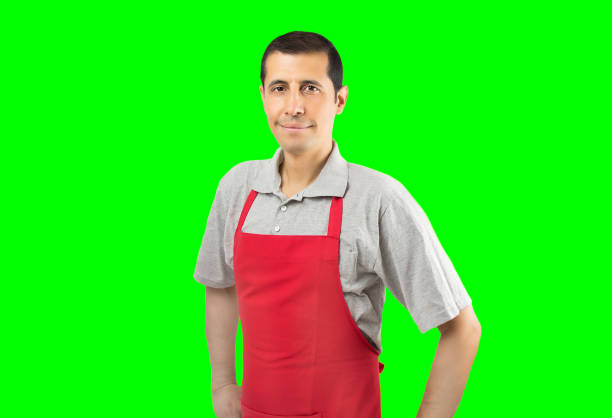 istock smiling shopman with chrome key 695034136