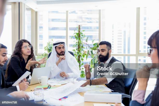 Arab Business Executive Chairing An Important Business Meeting Stock Photo - Download Image Now