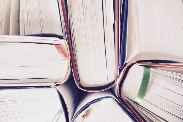 istock Hardcover books pile seen from above 695045110