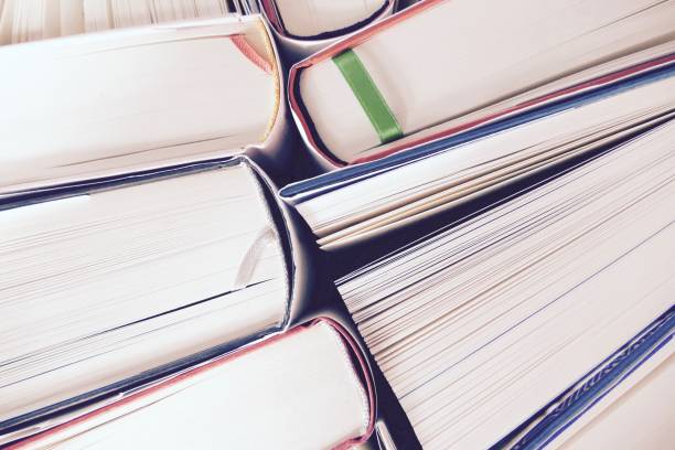 istock Hardcover books pile seen from above 695045150
