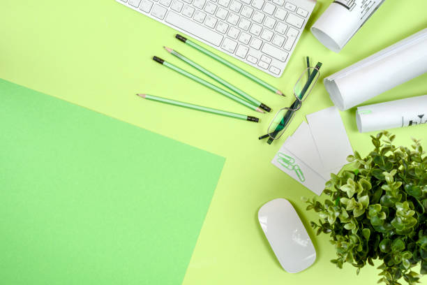 istock Office black desk table with white computer, supplies. 695055322