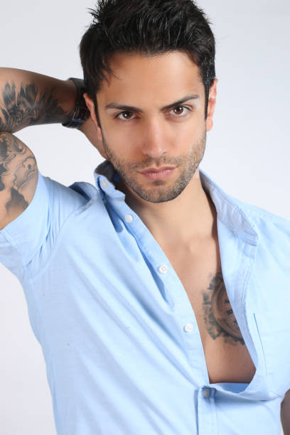 istock Sexy man with tattoo 695058742