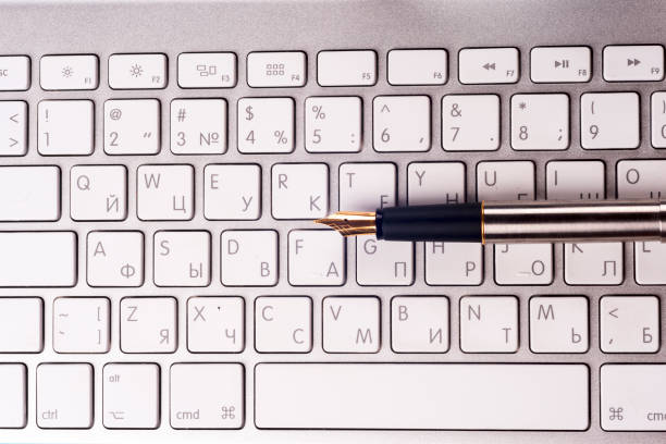 istock Office computer and pen. Top view with copy space. Corporate stationery branding mock-up. 695059184