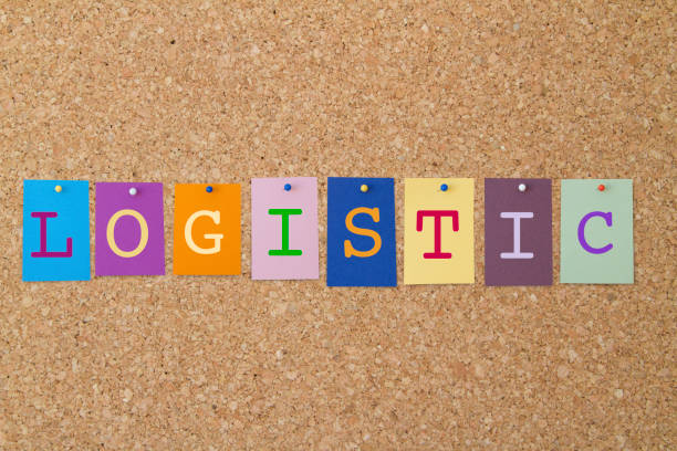 istock LOGISTIC word written on colorful sticky notes pinned on cork board. 695068408