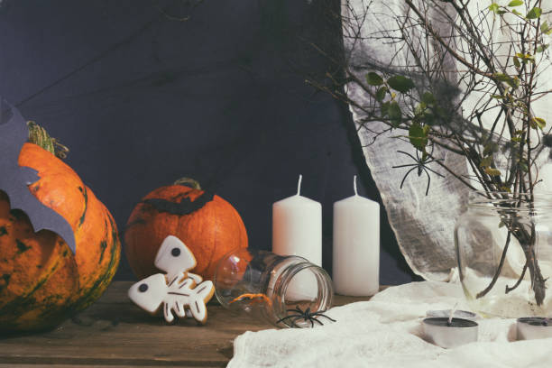 istock Halloween home decorations on dark background 695075600
