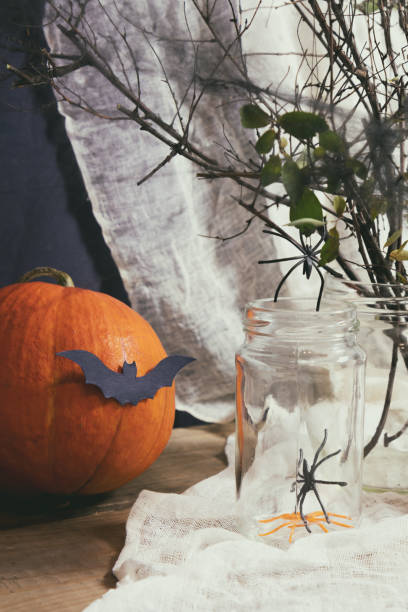 istock Halloween home decorations on dark background 695075624