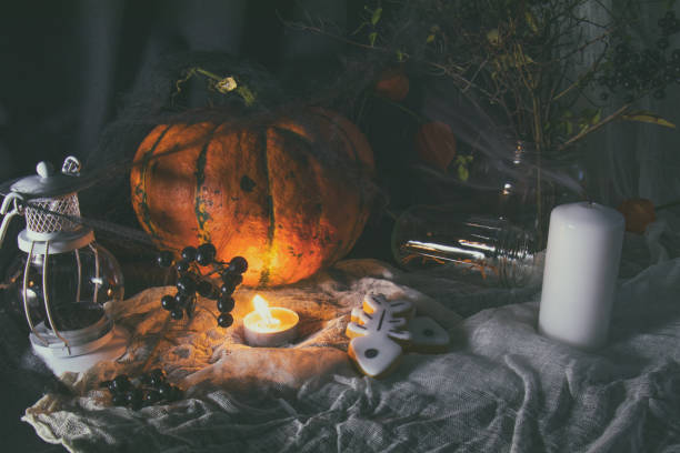 istock Halloween home decorations on dark background 695075670