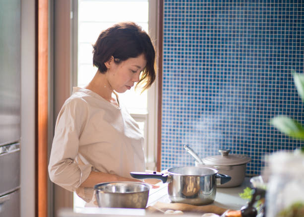 istock Japanese woman cooking for lunch 695091644
