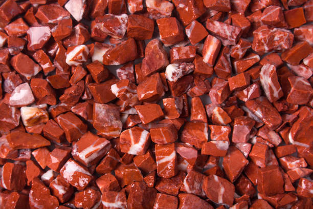 istock rosso levante, red natural marble on white background 695097414